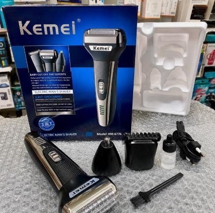 maquina de cortar cabelo kemei km-6558
